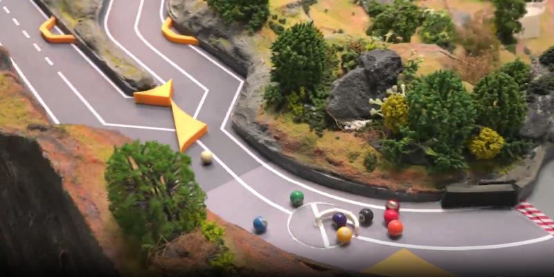 An image of Rotating arm and divided road layout at Construction Zone track